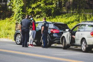 police officers addressing a car accident