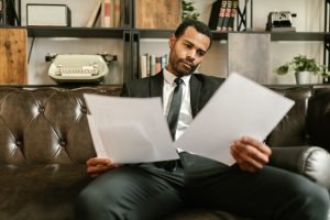 gentlemen looking over paperwork