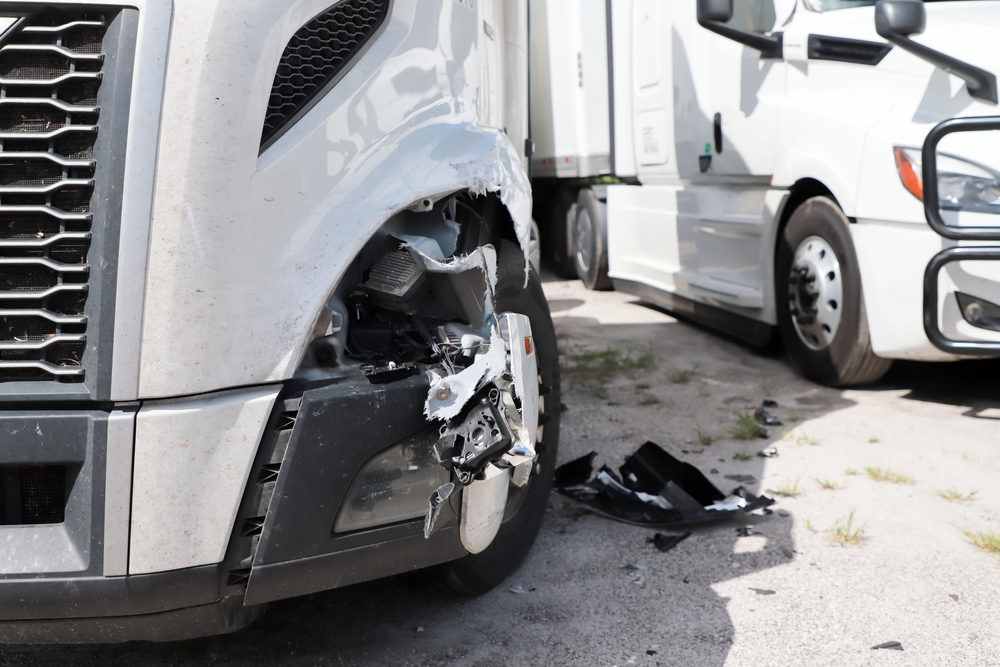 Damage to driver's side tire of a semi truck